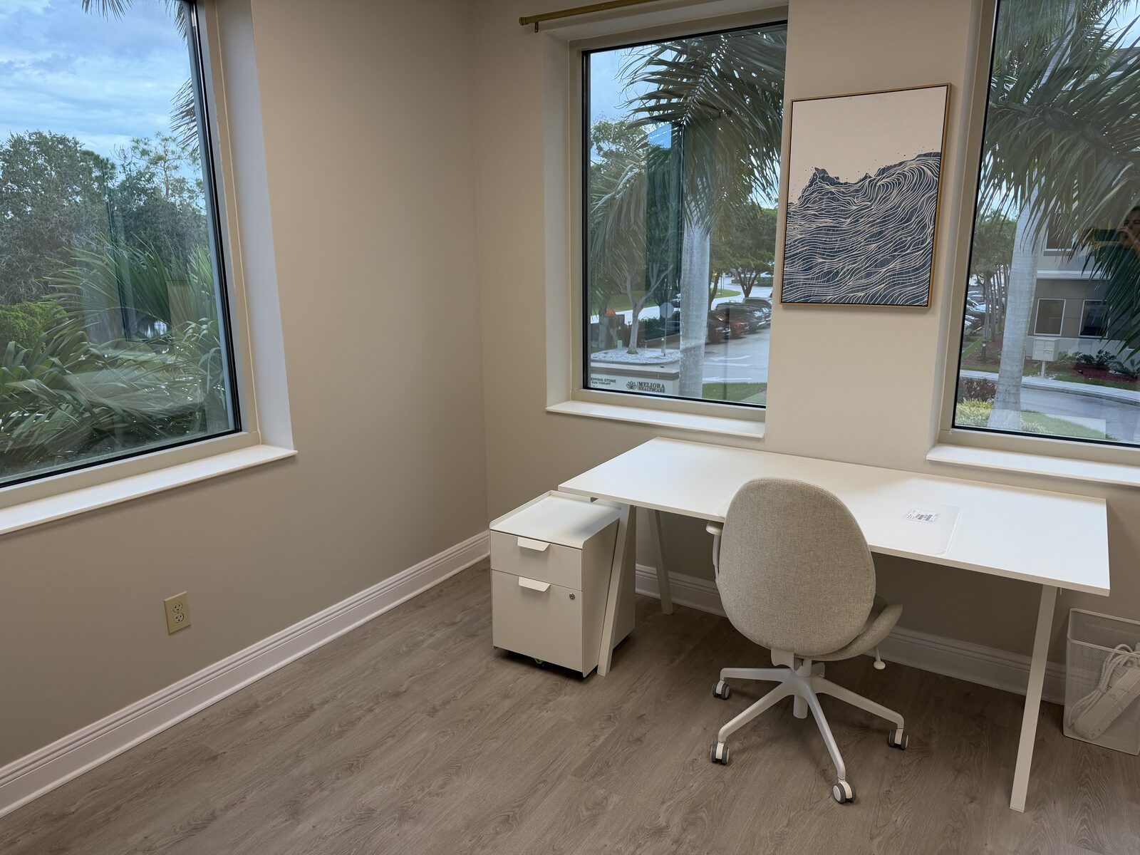Furnished private office with corner windows — ShoreOffices Naples
